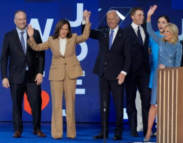 Kamala Harris and Joe Biden on stage with their families