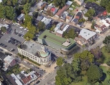 A rendering shows a proposed apartment building along Germantown Avenue from an overhead map view