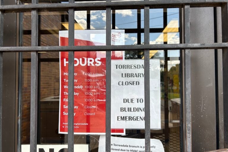 a closed sign at Torresdale Library