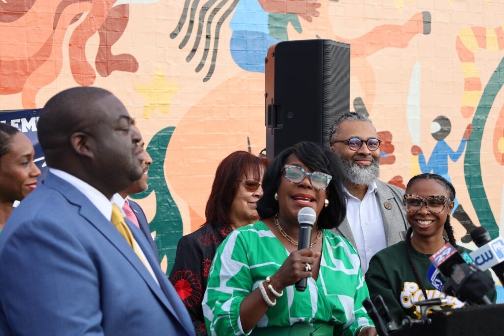 Mayor Parker speaking into a microphone