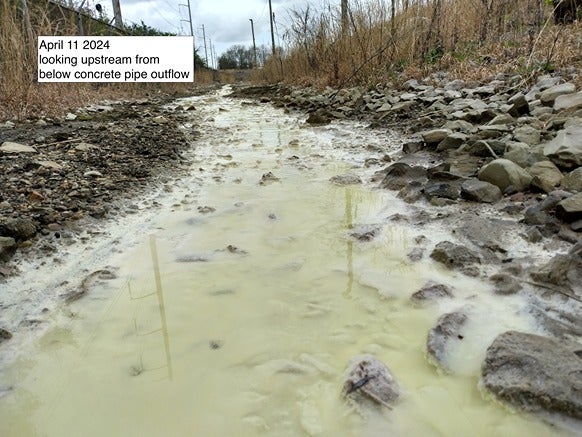 A yellowish-green stream of a substance at Bartram's Gardens in Philadelphia