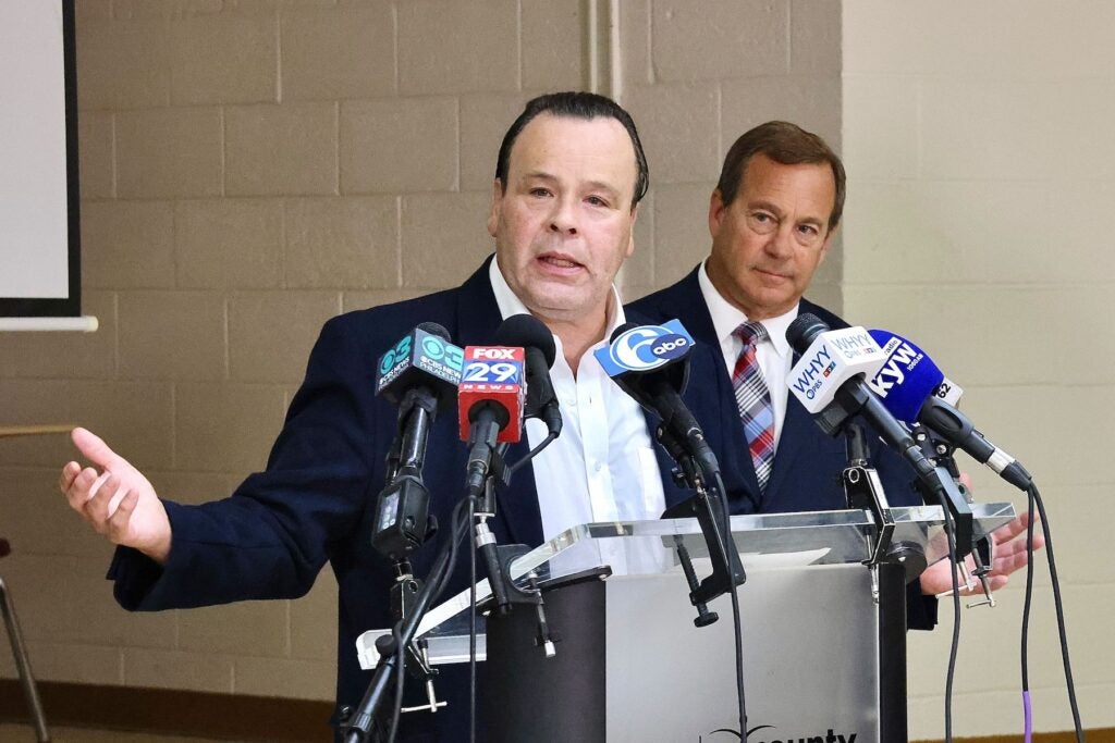 Edwin Ramos speaking at a podium