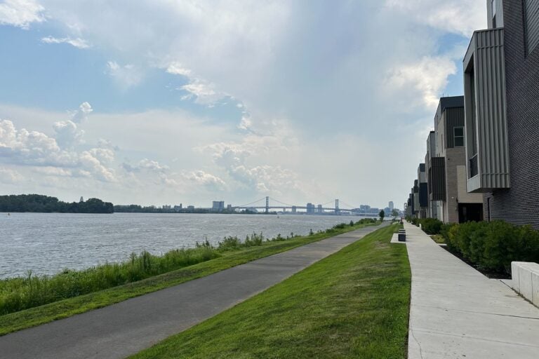 an apartment and sidewalk at the pier