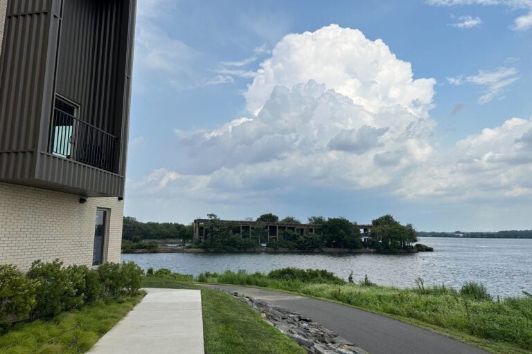 an apartment and sidewalk at the pier