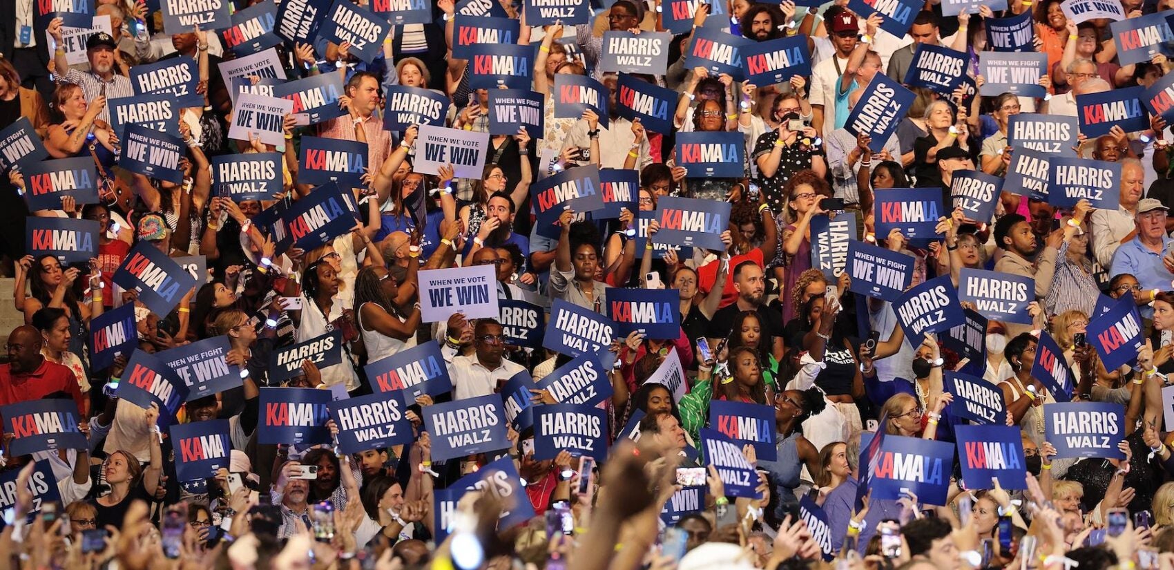 Excited supporters in the crowd at the Harris rally