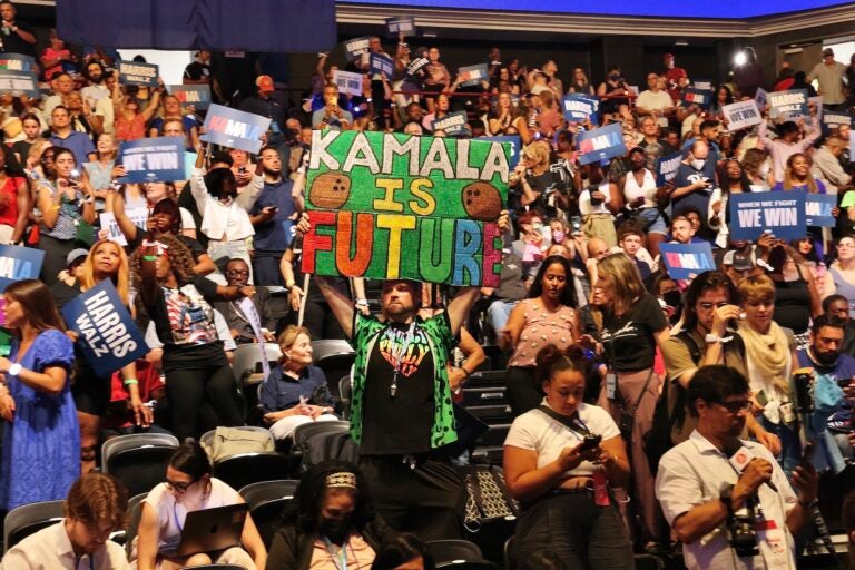 Excited supporters in the crowd at the Harris rally