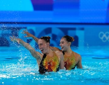 United States' Jaime Czarkowski and Megumi Field compete in the duet free routine of artistic swimming at the 2024 Summer Olympics, Saturday, Aug. 10, 2024, in Saint-Denis, France. (AP Photo/Lee Jin-man)