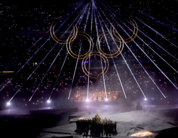 A general view as the final Olympic Ring is lifted into place to assemble the Olympic Rings during the Closing Ceremony on Sunday.