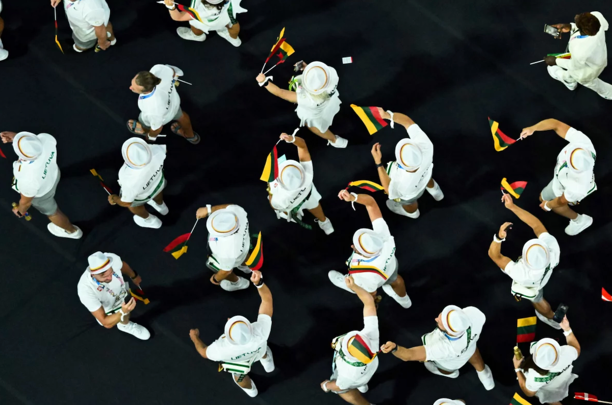 An overview shows Lithuania's athletes parading during the closing ceremony on Sunday.