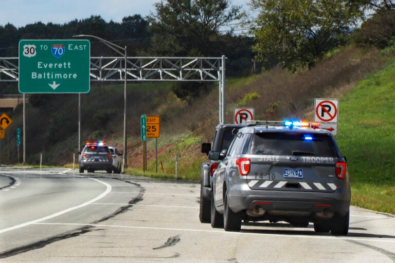 Pennsylvania State troopers pull over vehicles along the Pennsylvania Turnpik