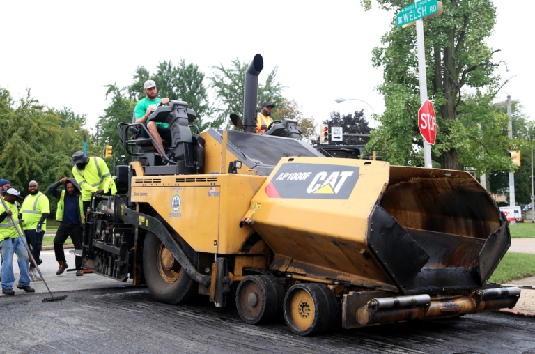 Workers are seen repaving a Philadelphia street