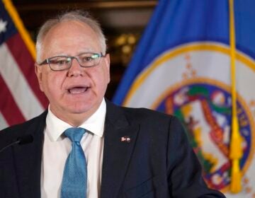 Minnesota Gov. Tim Walz speaks to the media, Nov. 9, 2022, in St. Paul, Minn.