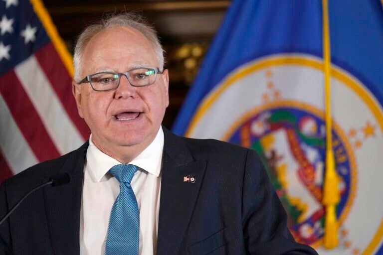 Minnesota Gov. Tim Walz speaks to the media, Nov. 9, 2022, in St. Paul, Minn.