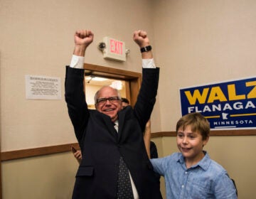 Tim Walz celebrating with his son