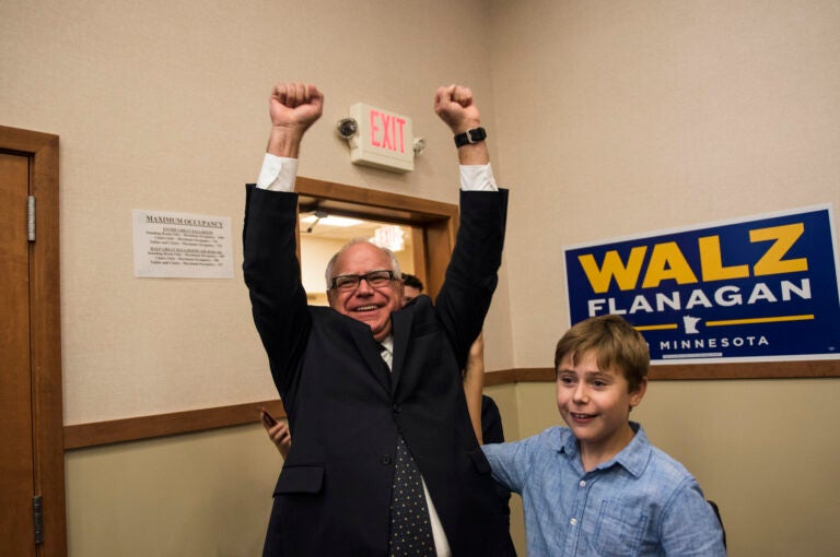 Tim Walz celebrating with his son