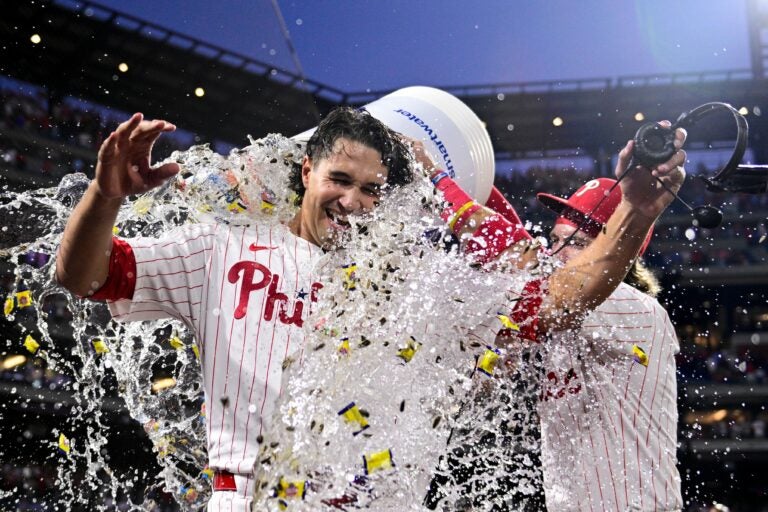 Tyler Phillips being doused with liquid