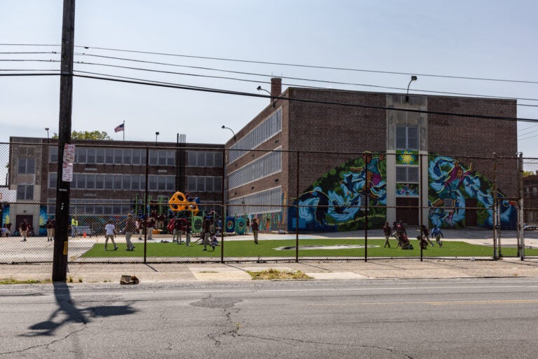 kids play in he play yard at Stephen Girard elementary school