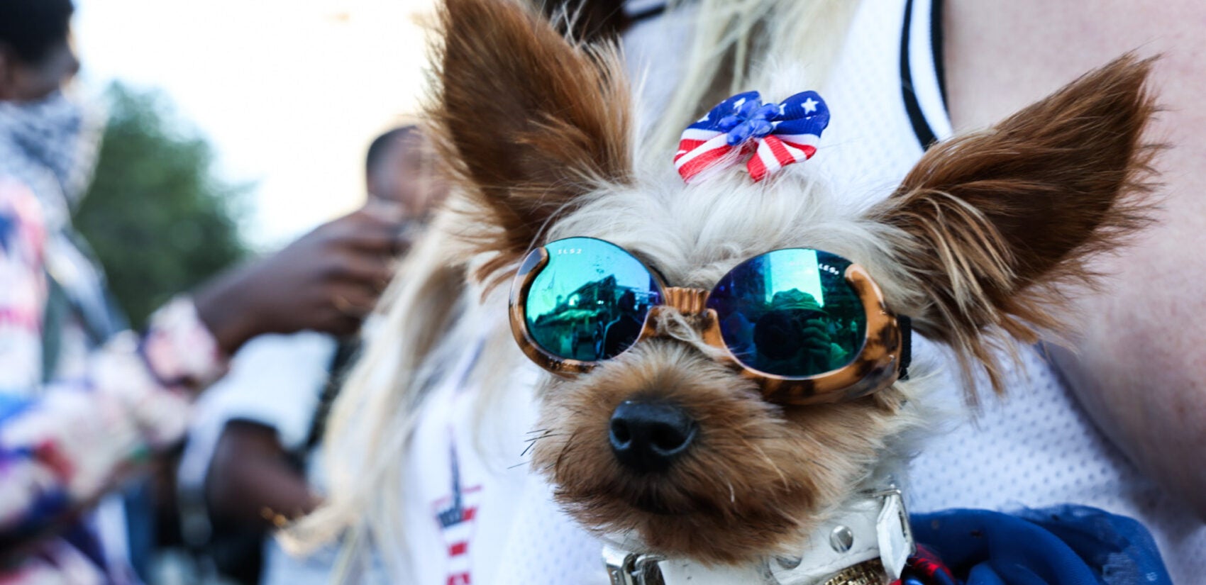 Lori Ney with her dog at the rally