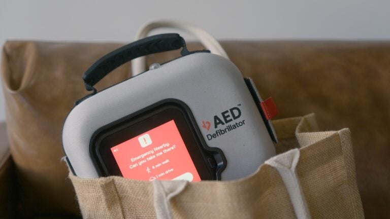 An automated external defibrillator (AED) is a medical device that evaluates a person's heart rhythm and delivers an electrical shock to help restore a normal rhythm during cardiac arrest. (Courtesy of Avive Solutions)