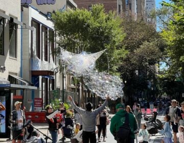 A bubble artist entertained pedestrian on Walnut Street's first car-free Sunday of September 2024.