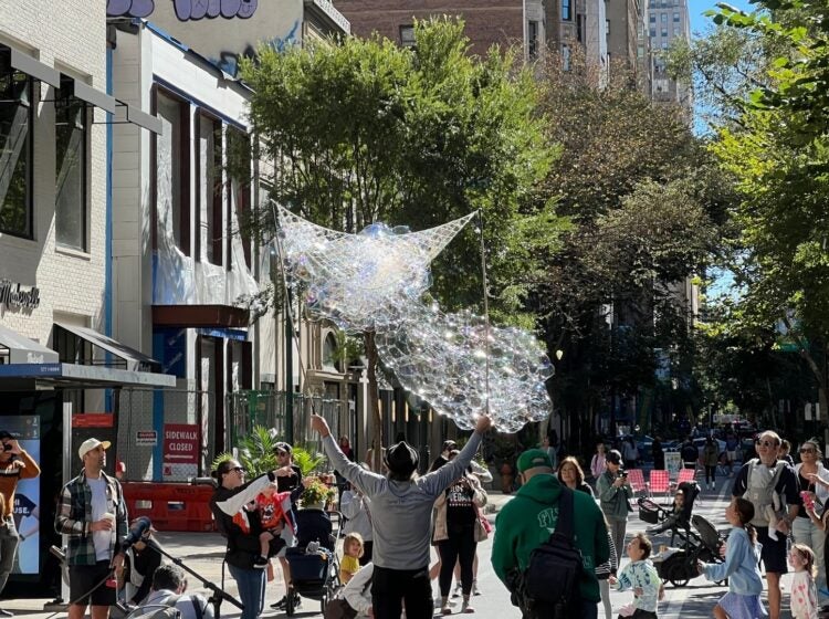 A bubble artist entertained pedestrian on Walnut Street's first car-free Sunday of September 2024.