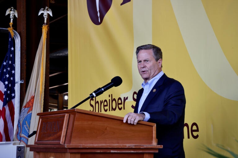 Donald Norcross speaking at a podium