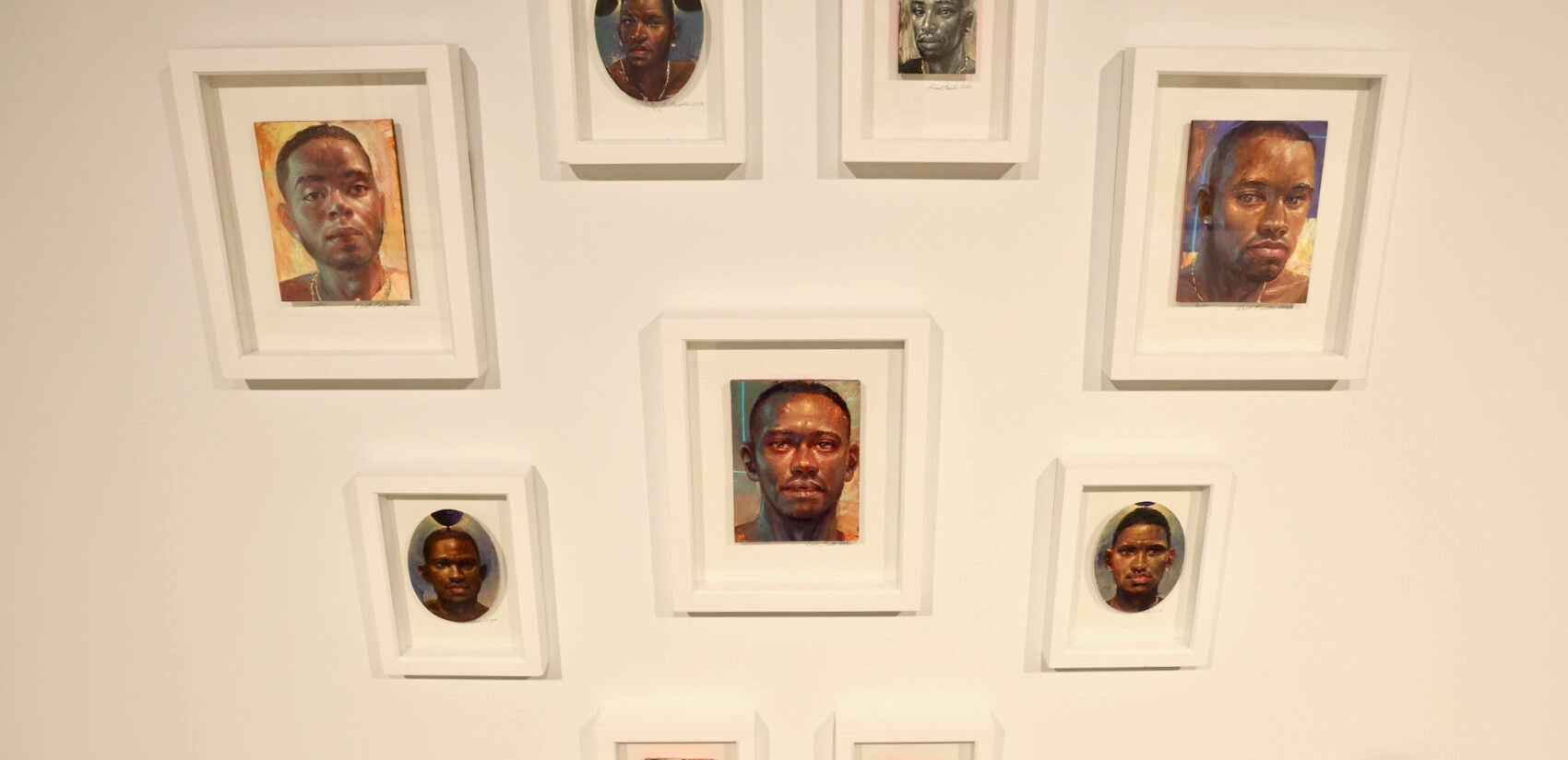 A collection of small portraits by New Orleans based artist Keith Perelli