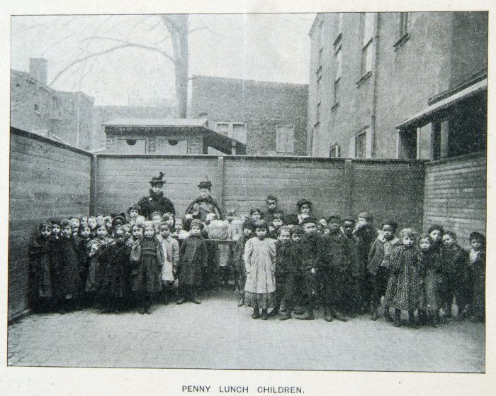 an old picture of children standing