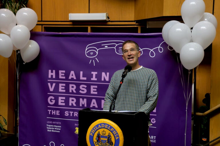 Rob Blackson speaking at a podium