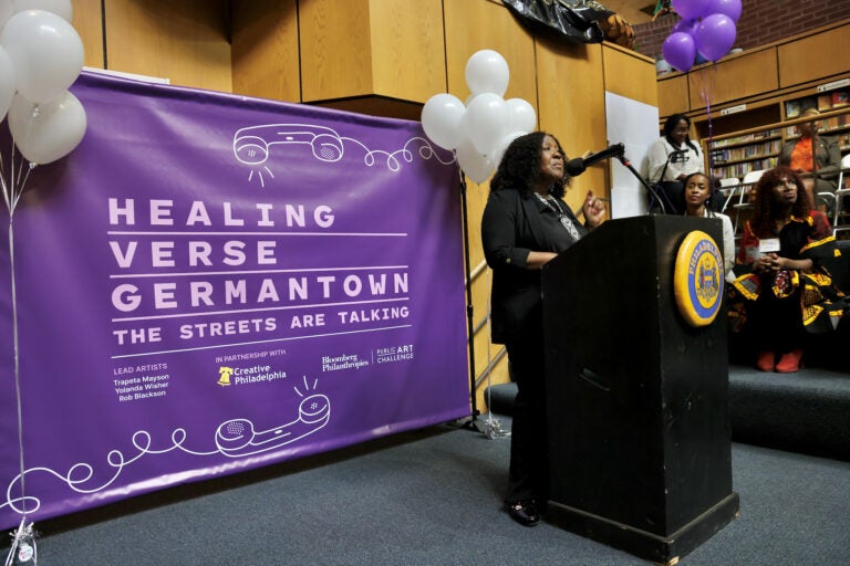 Trapeta Mayson speaking at a podium