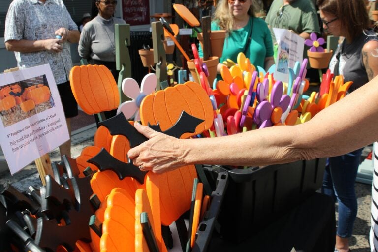 Various wares and handmade works of art, as well as several food options, were available at Germantown Avenue on Sunday. (Cory Sharber/WHYY)