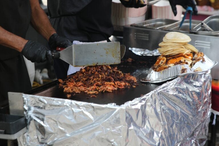 Various wares and handmade works of art, as well as several food options, were available at Germantown Avenue on Sunday. (Cory Sharber/WHYY)