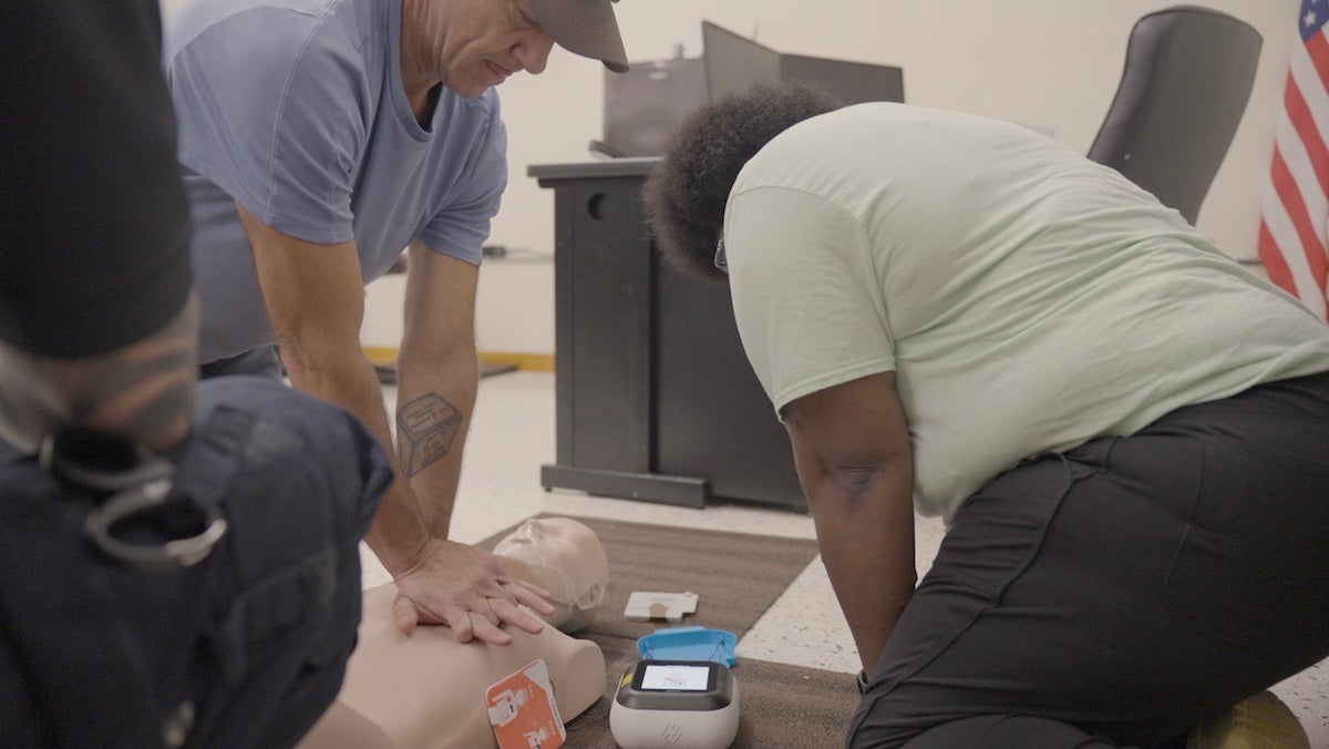 Volunteers are trained to use an Avive Solutions Automated External Defibrillator. (Courtesy of Avive Solutions)