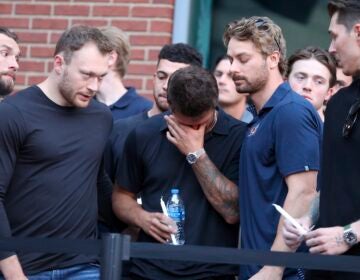 Columbus Blue Jackets players at vigil