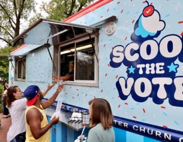 Potential voters line up at the Scoop the Vote truck