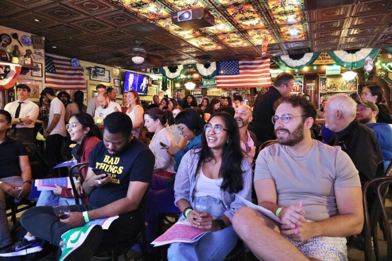 The crowd at McGillin’s Olde Ale House watches the Presidential debate. (Emma Lee/WHYY)