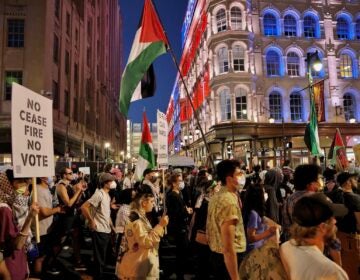 Protesters march in the street