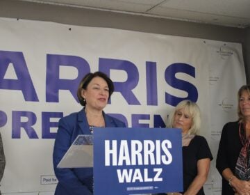 Amy Klobuchar speaking at a podium