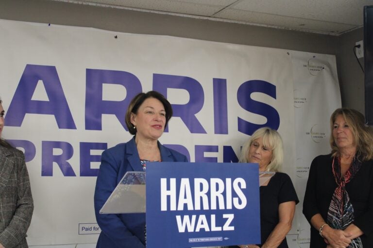 Amy Klobuchar speaking at a podium