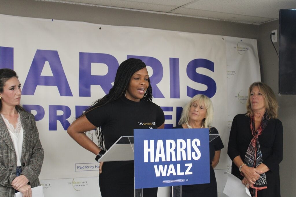 Kyra Brinson speaking at a podium