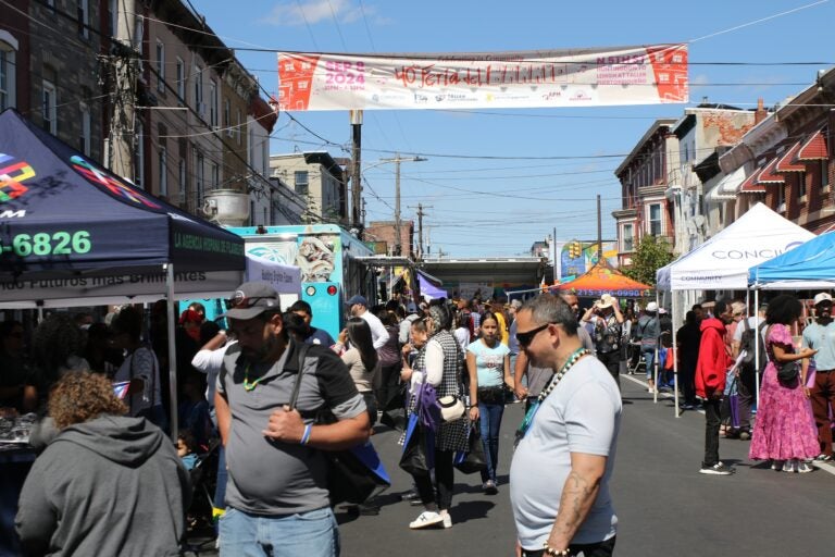 a crowd of attendees in the street