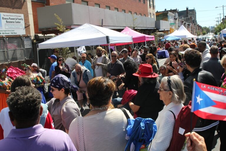 a crowd of attendees in the street