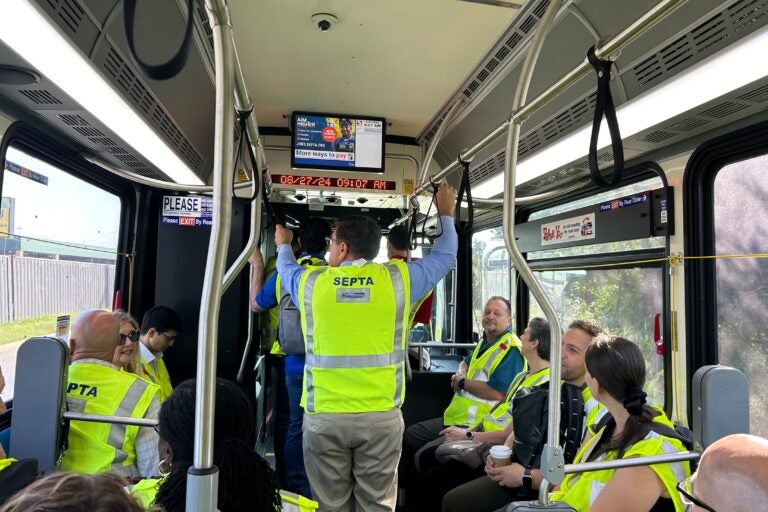 Employees with SEPTA on a new fuel cell bus