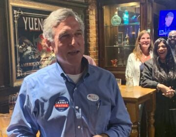 Outgoing Delaware Gov. John Carney speaks to supporters at Catherine Rooney's Irish bar after winning the race for Wilmington mayor. (Sarah Mueller/WHYY)