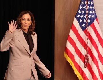 Kamala Harris enters the room