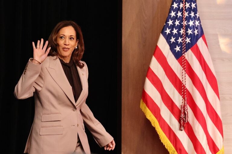 Kamala Harris enters the room