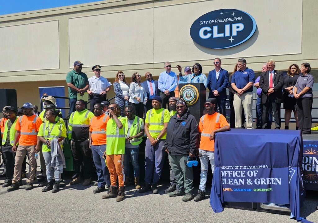 Mayor Cherelle Parker surrounded by workers