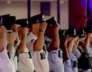 Police officers saluting