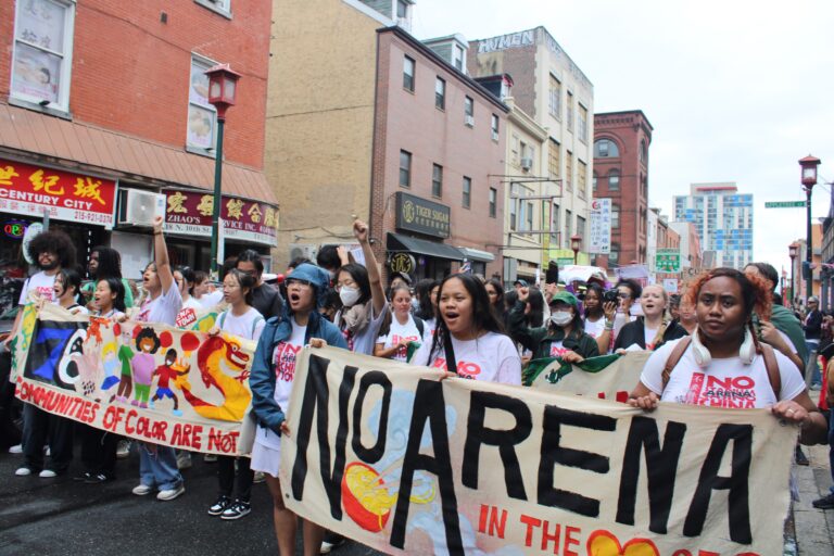 People march against the proposed new 76ers arena near Philadelphia's Chinatown neighborhood