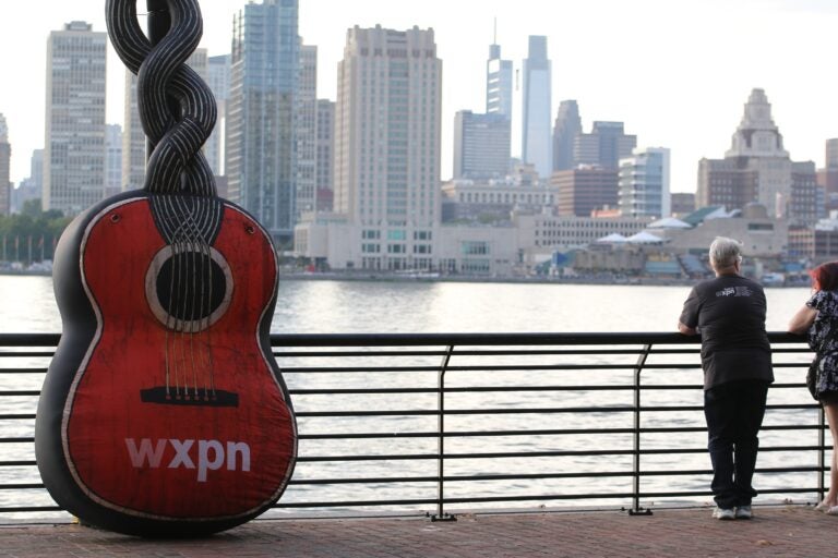 The Philadelphia skyline served as the picturesque backdrop for the 2024 XPoNential Music Festival at the Wiggins Waterfront Park in Camden. (Cory Sharber/WHYY)